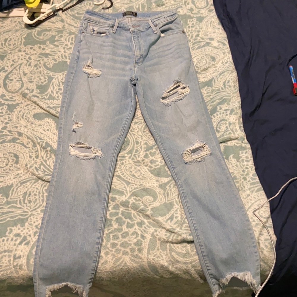 Mom jeans, holy and high rise